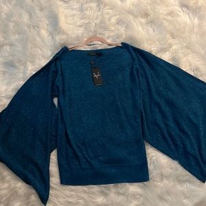 Vertigo, turquoise green, sweater/blouse.